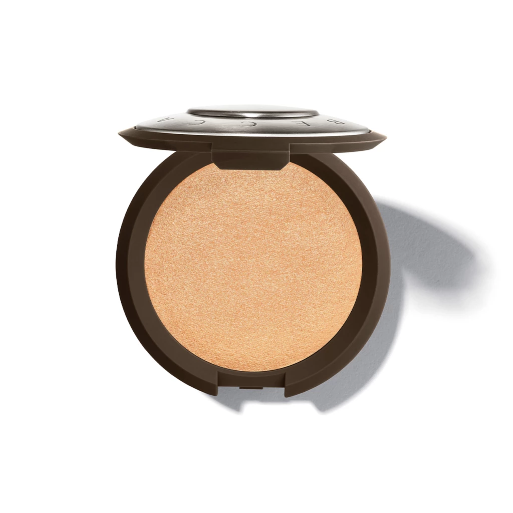 Smashbox - Becca Shimmering Skin Perfector Highlighter Champagne Pop på KICKS.se